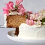 A slice of cake being lifted out of the plate