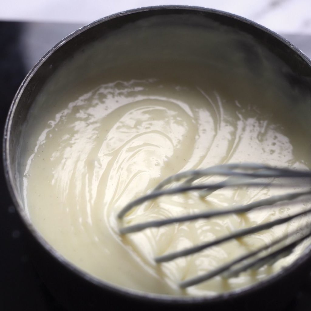 A saucepan with silk whole egg pastry cream.