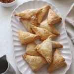 A platter of sweet cream cheese hand pies.