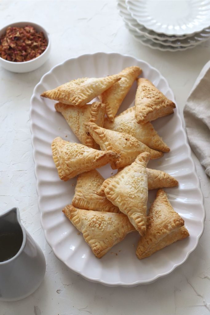 A platter of sweet cream cheese hand pies.