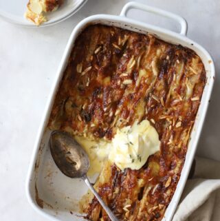 Pear and Camembert Crinkle Pie served with whipped cream.
