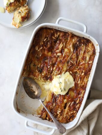 Pear and Camembert Crinkle Pie served with whipped cream.